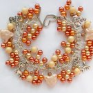Cat peach cream pearl pressed glass bead cha cha charm bracelet Cat peach cream pearl pressed glass bead cha cha charm bracelet