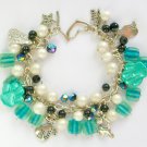 Cat and aw teal green AB black white bead charm bracelet Cat and aw teal green AB black white bead charm bracelet