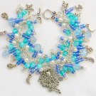 Fairy moon pressed Czech star iridescent  bead aqua blue charm bracelet