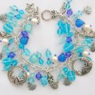 Mermaid fish Czech seashell bead aqua and blue charm bracelet