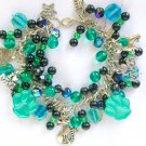 Cat and paw print teal green black AB glass bead charm bracelet Cat and paw print teal green black AB glass bead charm bracelet