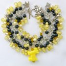 Dog yellow and black pony bead cha cha charm bracelet Dog yellow and black pony bead cha cha charm bracelet