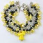 Dog yellow and black pony bead cha cha charm bracelet