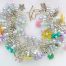 Pastel purple blue yellow flower Czech butterfly charm bracelet
