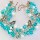 Guardian Angel aqua blue crackle glass bead charm cha cha bracelet