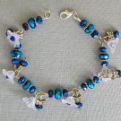 White bell flower butterfly peacock blue AB crystal bead bracelet earrings set White bell flower butterfly peacock blue AB crystal bead bracelet earrings set