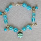 Aqua blue AB moon Czech glass bead and star bracelet earrings set