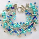 Dolphin seashell crystal bead aqua blue charm bracelet