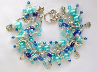 Dolphin seashell crystal bead aqua blue charm bracelet