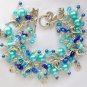 Dolphin seashell crystal bead aqua blue charm bracelet