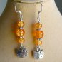 Hello kitty cat purple pink orange aqua teal brown charm earrings