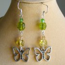 Butterfly charm green yellow pressed glass flower bead earrings