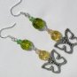 Butterfly charm green yellow pressed glass flower bead earrings
