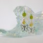 Butterfly charm green yellow pressed glass flower bead earrings