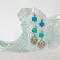 Dragonfly on leaf charm aqua blue pressed glass flower bead earrings