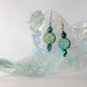 Iridescent black aqua AB Czech glass full moon face bead earrings