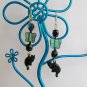 Black cat AB iridescent aqua Czech glass butterfly bead earrings