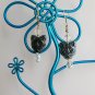 Cat face black pressed glass bead drop earrings