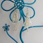 Clear iridescent crystal bugle seed bead dangle earrings
