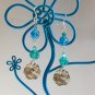 Dragonfly on leaf charm aqua blue pressed glass flower bead earrings