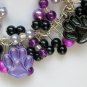 Paw print purple black bead animal lover charm bracelet