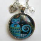 Blue swirl Cat with birds cabochon charm pendant necklace Blue swirl Cat with birds cabochon charm pendant necklace