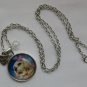 Dog cocker spaniel with scarf and hat cabochon charm pendant necklace