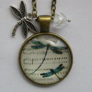 Blue Dragonfly on music sheet cabochon charm pendant necklace Blue Dragonfly on music sheet cabochon charm pendant necklace