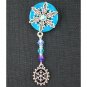 Snowflake charm aqua blue crystal bicone dangle lapel pin