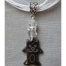 Hematite cat crystal pendant on white organza ribbon necklace Hematite cat crystal pendant on white organza ribbon necklace