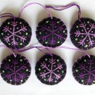 Handmade purple shades snowflake felt ornament on black lot