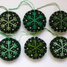 Handmade green shades snowflake felt ornament on black lot handmade