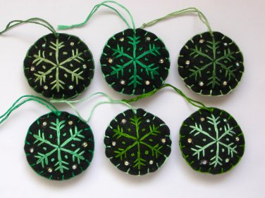 Handmade green shades snowflake felt ornament on black lot handmade