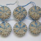 Handmade ombre blue snowflake felt country ornament on brown lot Handmade ombre blue snowflake felt country ornament on brown lot