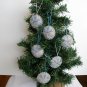 Handmade ombre blue snowflake felt country ornament on brown lot