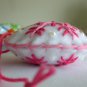 Handmade rainbow colorful snowflake felt ornament on white lot