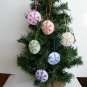 Handmade rainbow colorful snowflake felt ornament on white lot