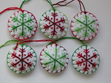 Handmade green and red classic snowflake felt ornament on white lot
