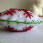 Handmade green and red classic snowflake felt ornament on white lot