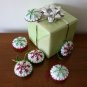 Handmade green and red classic snowflake felt ornament on white lot