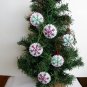 Handmade green and red classic snowflake felt ornament on white lot