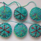 Handmade red pink blue snowflake felt ornament on aqua lot Handmade red pink blue snowflake felt ornament on aqua lot