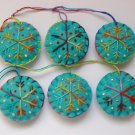 Handmade yellow blue rainbow snowflake felt ornament on aqua lot Handmade yellow blue rainbow snowflake felt ornament on aqua lot