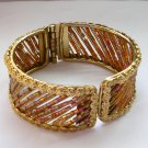 Iridescent shimmer bugle seed bead gold tone hinge cuff bracelet Iridescent shimmer bugle seed bead gold tone hinge cuff bracelet