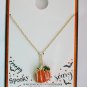 Halloween enamel pumpkin with green rhinestone leaf pendant necklace