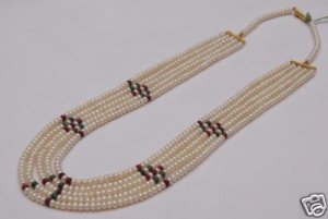 Five lines mala with ruby and emarald stone beeds
