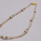 Oval Shaped Pearls Mala with Gold Colored Pearls