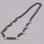 Hyderabad Oval Shape Pearls Mala of White, Black Pearls