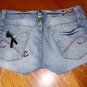 Denim shorts with buttons and sequins