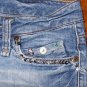 Denim shorts with buttons and sequins